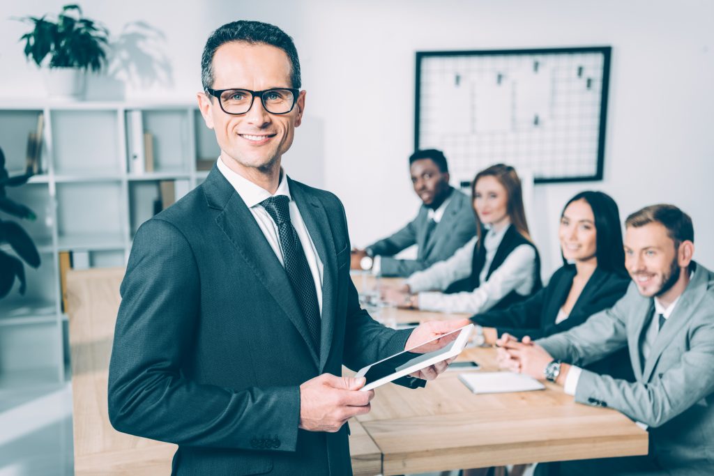 A group of solicitors discussing dispute with a distributor