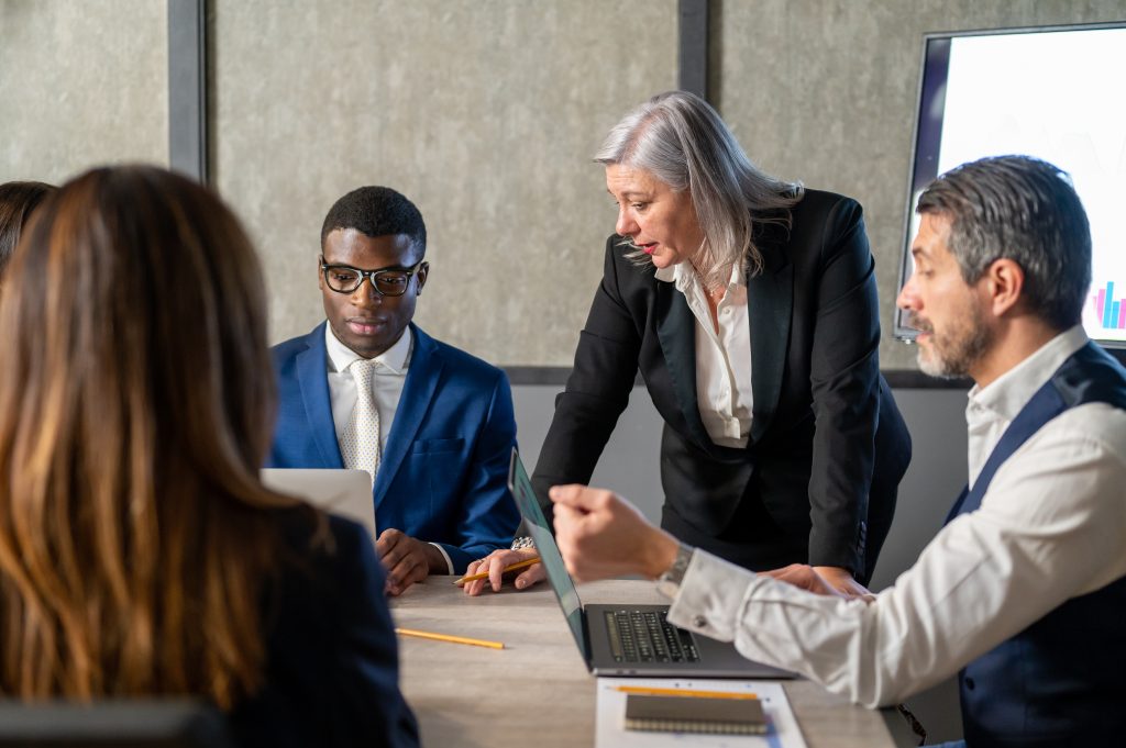 A group of solicitors discussing due diligence